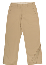 Load image into Gallery viewer, Full-length view of khaki pants demonstrating one leg zipper in unzipped position