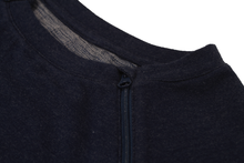 Load image into Gallery viewer, Close-up view of raglan-sleeve dress in navy demonstrating detailing of ribbed crew-neck trim, zipper pull covers, and fabric texture
