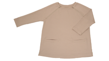Load image into Gallery viewer, Full view of women's raglan-sleeve top in taupe featuring bracelet-length sleeves, two double-welt front pockets, and both upper chest zippers in zipped position