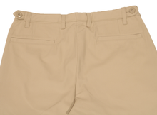 Load image into Gallery viewer, Close-up view of khaki pants to demonstrate detailing of rear welt pockets and expandable side button adjustment