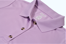 Load image into Gallery viewer, Close-up view of lilac polo dress demonstrating detailing of button placket, ribbed collor, and fabric texture
