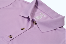 Load image into Gallery viewer, Close-up view of lilac polo dress demonstrating detailing of button placket, ribbed collor, and fabric texture