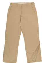 Load image into Gallery viewer, Full-length view of khaki pants demonstrating one leg zipper in unzipped position
